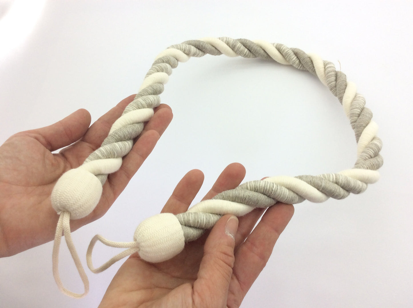 Linen and Cotton. A natural rope curtain tie-back, 25mm thick and 80cm long. Rustic, nautical, and shabby chic style, neutral for any decor.