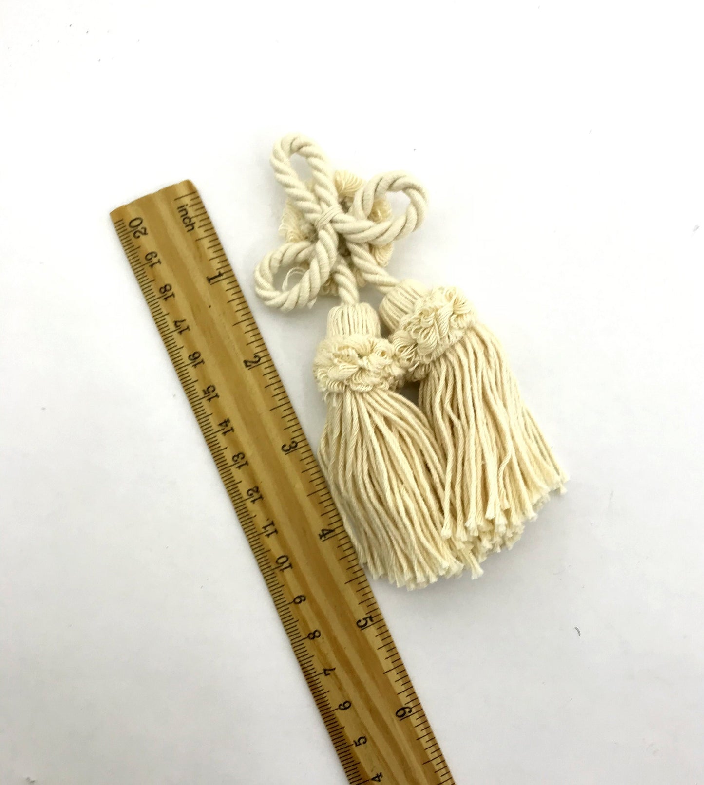 Rosette with cotton tassel bow. Decoration for cushion, sofa, curtain, bags, clothes. Handmade made in Italy
