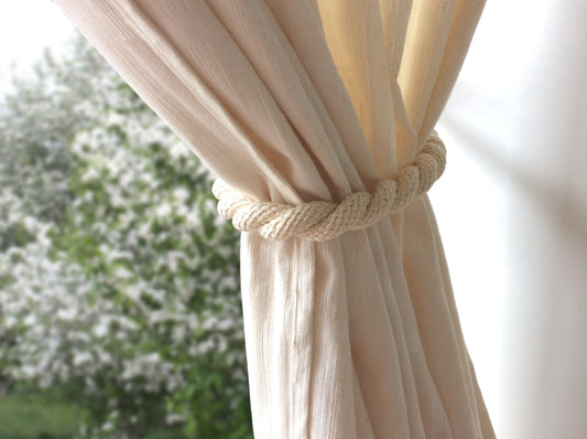 Cotton. A 16mm magnetic curtain tie-back, 75cm long. Rustic, nautical, and shabby chic style, neutral for any decor.