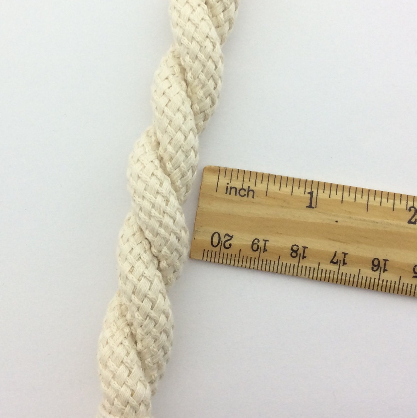 Cotton. A 16mm magnetic curtain tie-back, 75cm long. Rustic, nautical, and shabby chic style, neutral for any decor.