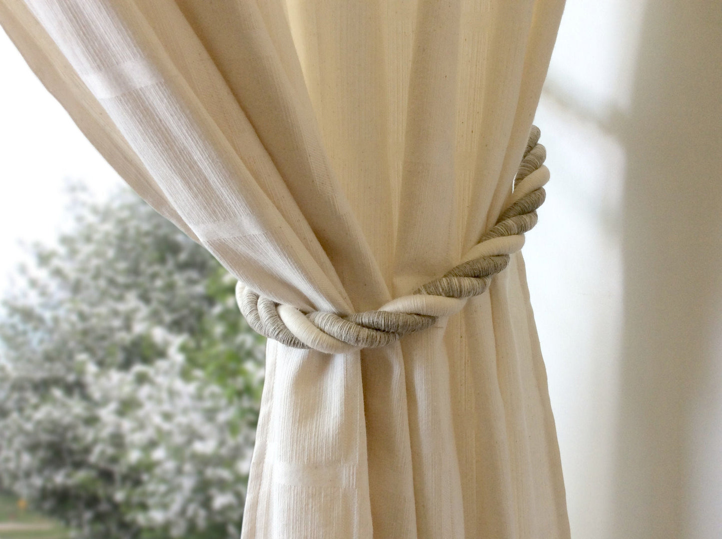 Linen and Cotton. A natural rope curtain tie-back, 25mm thick and 80cm long. Rustic, nautical, and shabby chic style, neutral for any decor.