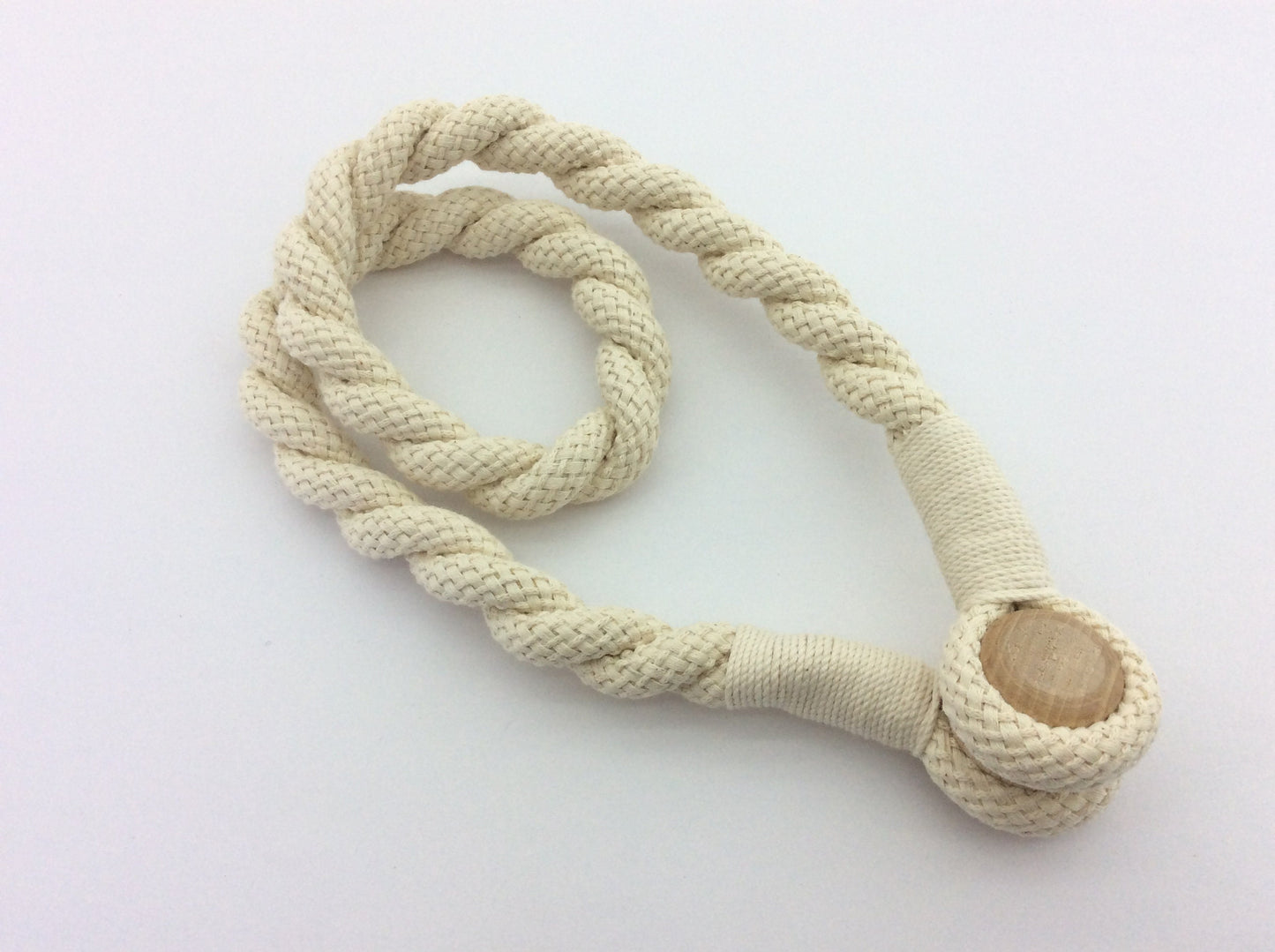 Cotton. A 16mm magnetic curtain tie-back, 75cm long. Rustic, nautical, and shabby chic style, neutral for any decor.