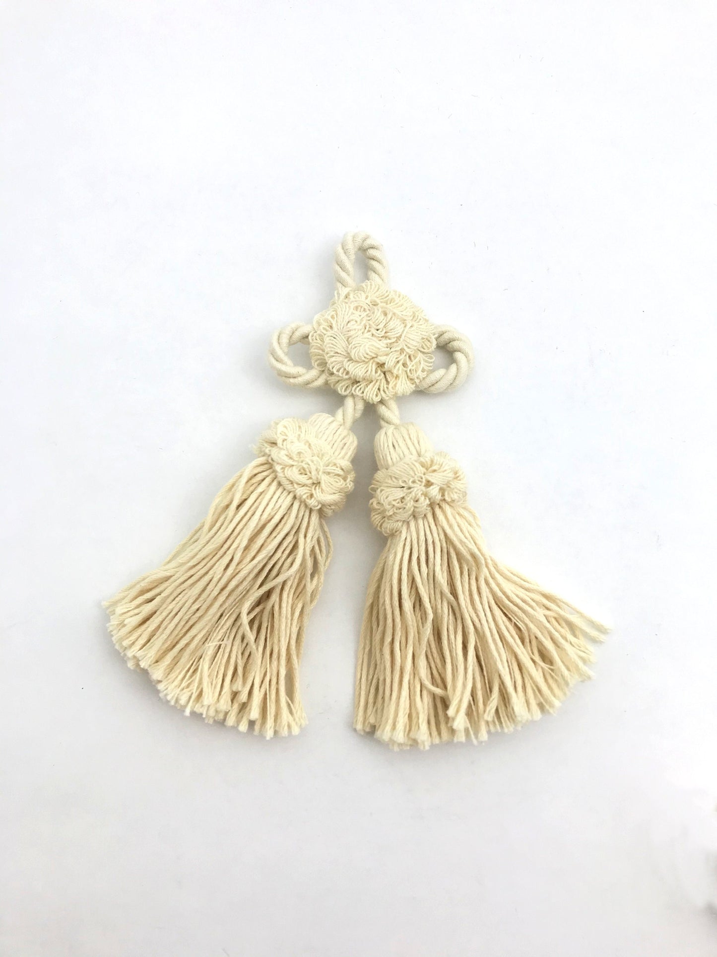 Rosette with cotton tassel bow. Decoration for cushion, sofa, curtain, bags, clothes. Handmade made in Italy