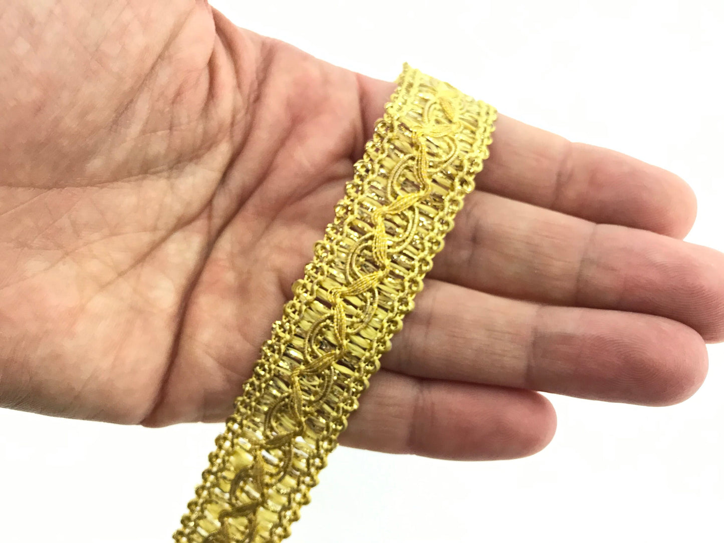 1 meter gold sew-on trim 20mm. Fashion decoration for bags, shoes, belts, trousers, and sweaters.